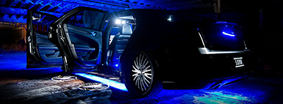 Black Chrysler 300 with blue LED lights interior